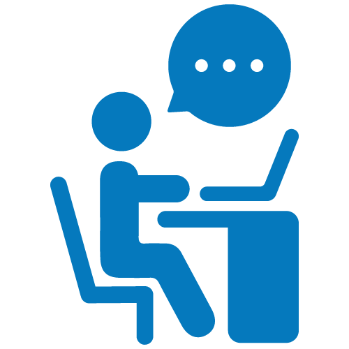 Blue icon of a person sitting at a desk on their laptop with a chat bubble over their head