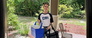 PAR employee delivering a meal for Meals on Wheels Tampa